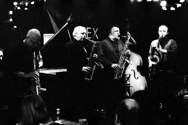 Lol Coxhill, Elton Dean, Evan Parker, Simon Picard; also John Edwards (hidden in the background with the double bass), Mark Sanders (not visible)