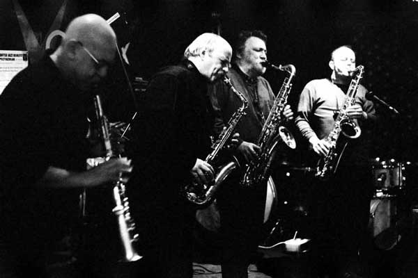 Lol Coxhill, Elton Dean, Evan Parker, Simon Picard; also John Edwards (hidden in the background with the double bass), Mark Sanders (not visible)